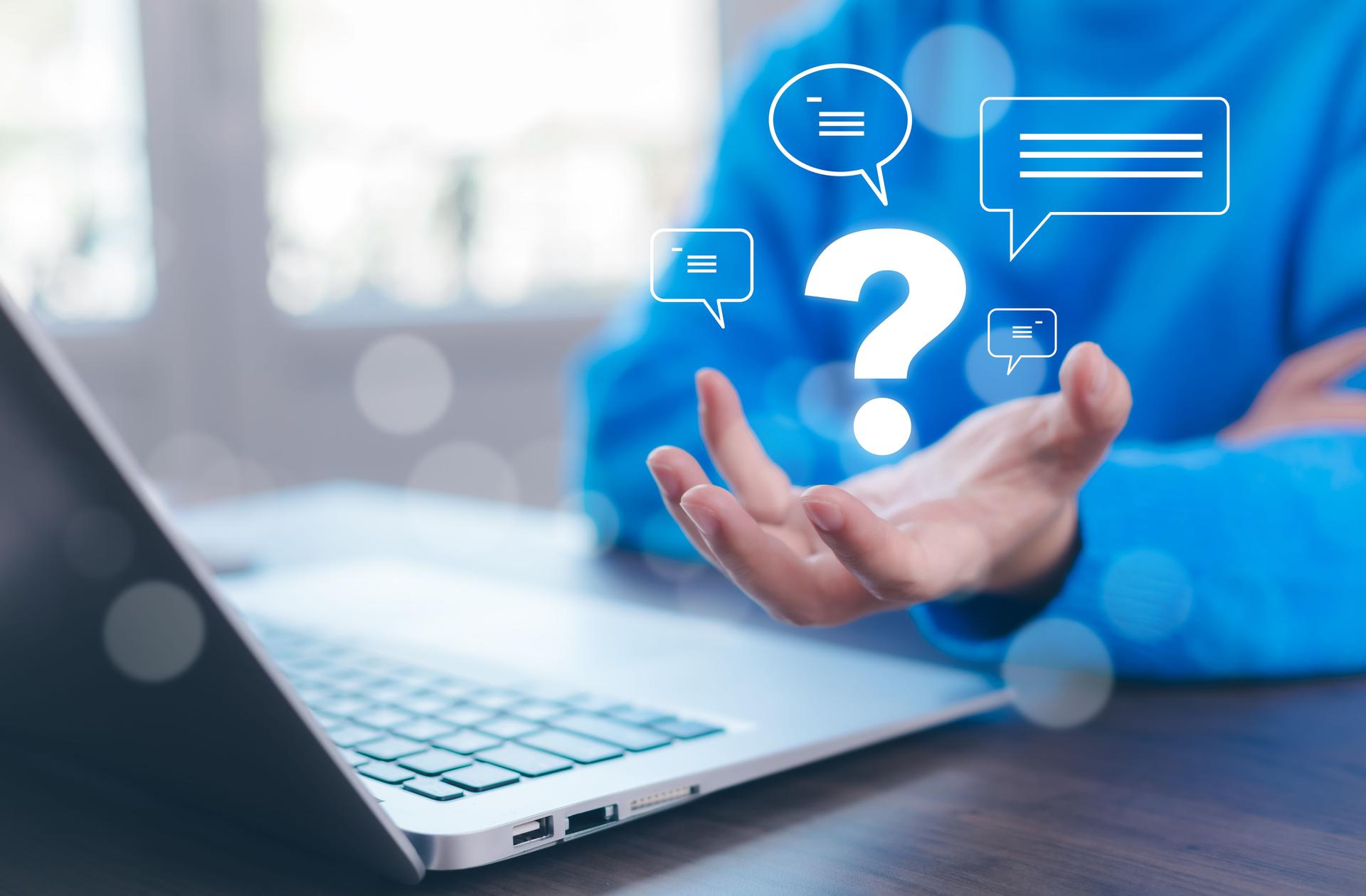 Ask question online concept, hand hold interface question marks sign web, Question marks drawn on black background. Concept of searching for an answer, Uncertainty and problem solving.